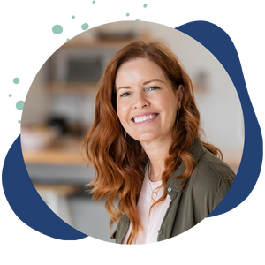 woman in gray and white shirt smiling 