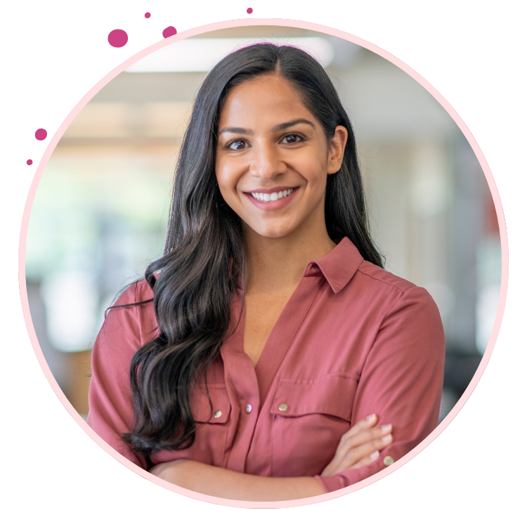 woman smiling with arms folded