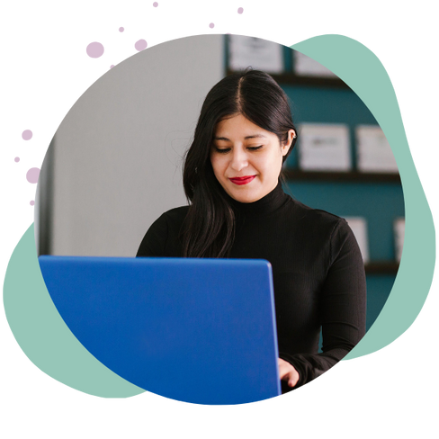 woman types on laptop